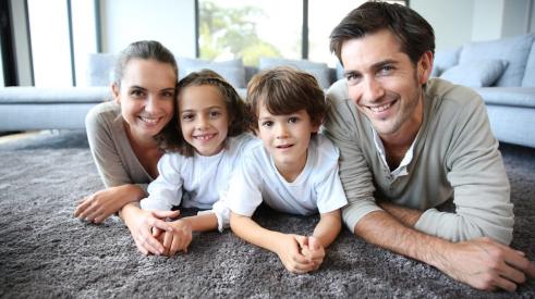 Family enjoying healthy indoor air quality in a net zero home