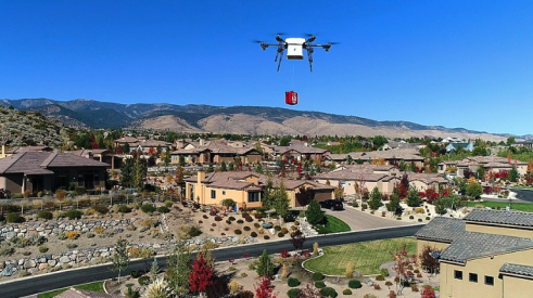 Drone delivering package to a home