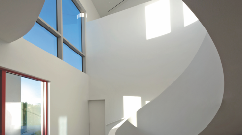 sculptural staircase design detail in a Sarasota custom home by Michael K. Walker & Associates