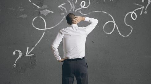 solve sales and marketing problem_identify problem_Man at chalkboard, scratching head (Photo: alphaspirit / 123RF)