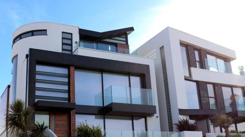 Modern home exterior on sunny day