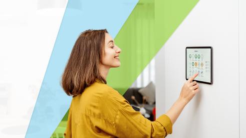 Woman in home with smart electric panel