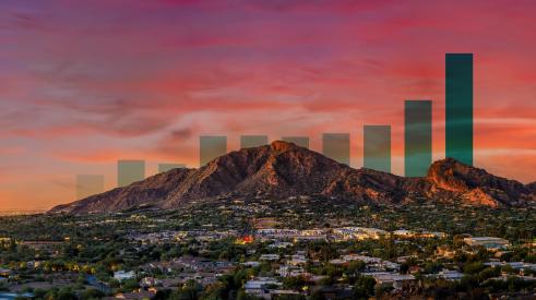Camelback Mountain in phoenix arizona with sunset and data graph behind