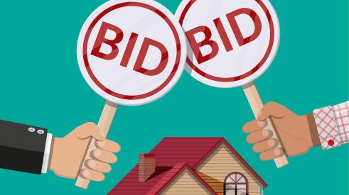 Home buyers bidding on a house