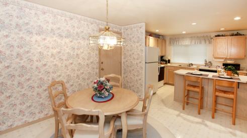 Outdated kitchen dining room in pastel colors