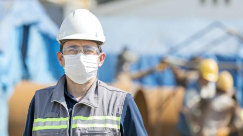 Construction worker wearing mask