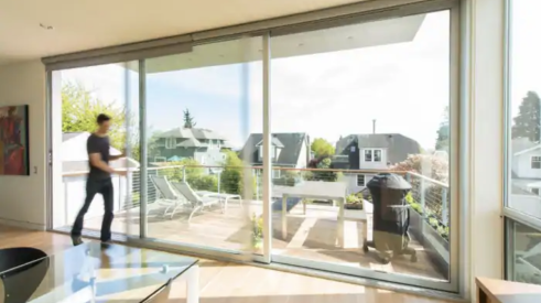 La Cantina's multi-slide aluminum doors help connect the indoors to outside