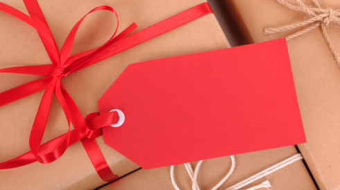 Gift wrapped with red ribbon