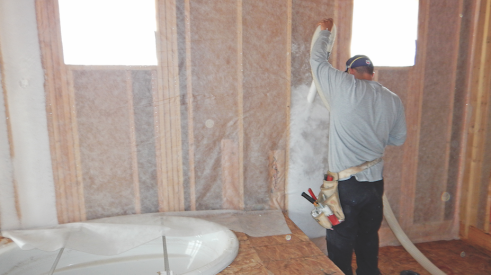 Installing blown-in fiberglass insulation
