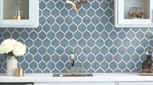 Inspired by Greek mythology, the Divine mosaic series from Emser Tile boasts clean, contemporary arabesque lines and a gloss finish. Dark-toned borders outline light neutrals and blue tiles, while white borders accent warmer blue and green tiles. The tiles are ideal for backsplashes, shower walls, or accent walls. IBS Booth C7237. 