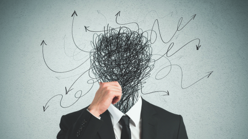 man with scribble for a head shows confusion and complexity at work