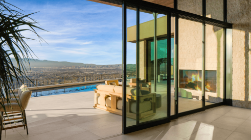 The New American Home includes Western Window Systems' Series 600 Multislide Doors 