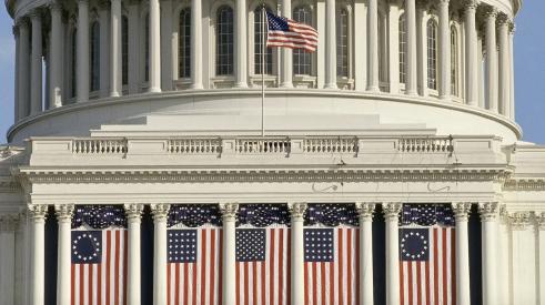 U.S Capitol draped with American flags