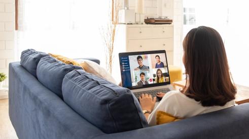 Woman at home in virtual meeting