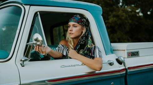 Woman driving a pickup truck
