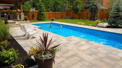 Beautiful backyard with rectangular in-ground swimming pool