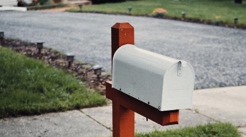 Mailbox in front of single-family home