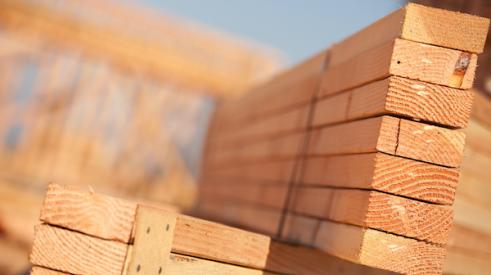 Stacks of building lumber boards