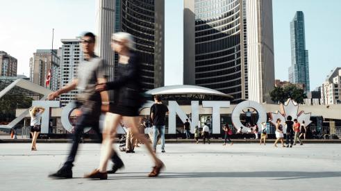 People walking through Toronto