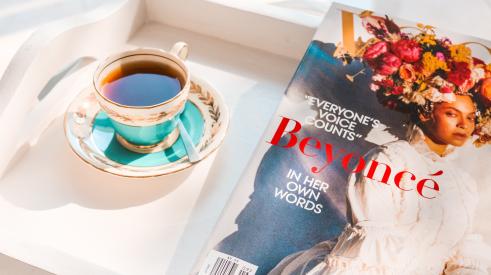 Breakfast tray with tea and Beyoncé cover of Vogue magazine September 2018 issue
