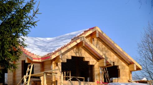House under construction in winter