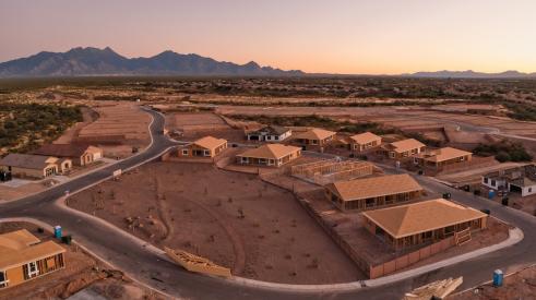 Aerial view of Arizona houses under construction in suburban subdivision