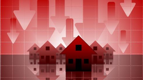 Houses surrounded by red falling arrows