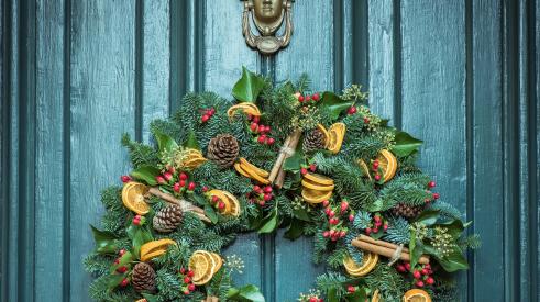 Housing forecast for 2019_housing experts weigh in_image: front door with wreath