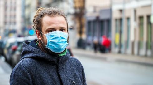 Man wearing mask to protect against coronavirus
