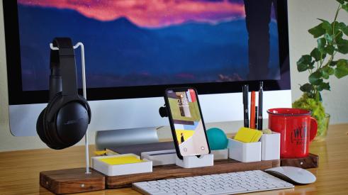 Desk with computer and other office supplies