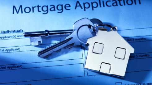 House keys on mortgage application form 