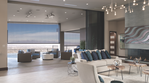 The New American Home 2020 interior with retractable screens opening to views over Las Vegas