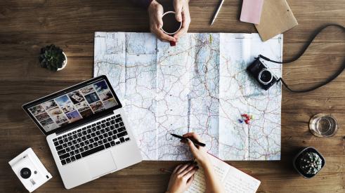Travel planning tools on a table