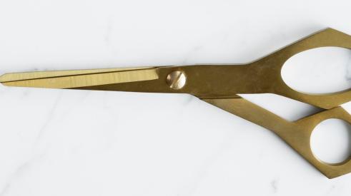 Gold pair of scissors