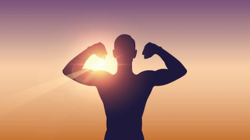 silhouette of man flexing biceps
