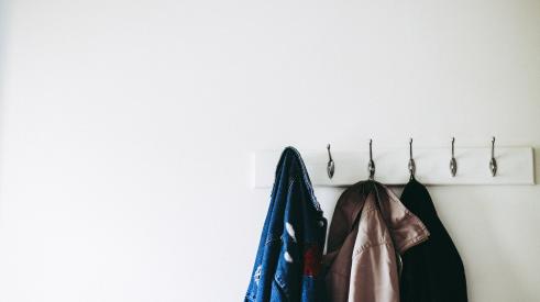 House interior coat hooks with coats hanging