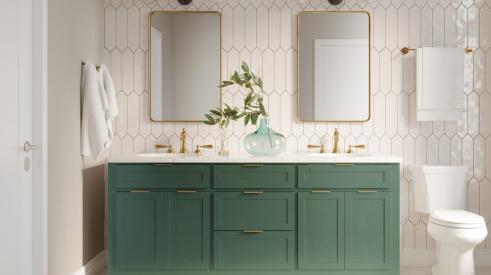 White tiled bathroom with green cabinetry