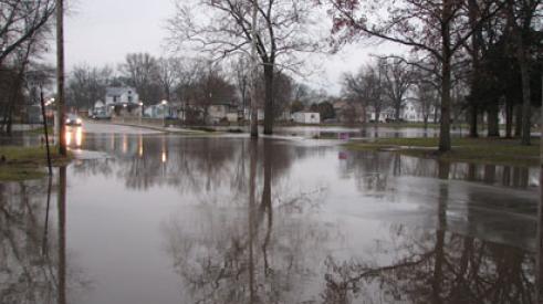 Floodwaters rising in residential neighborhood