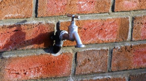 Spigot on a brick wall | mortgage application volume fell as interest rates ticked up, showing timid economic sentiment