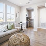 Living room and kitchenette at Cardiff at River Islands