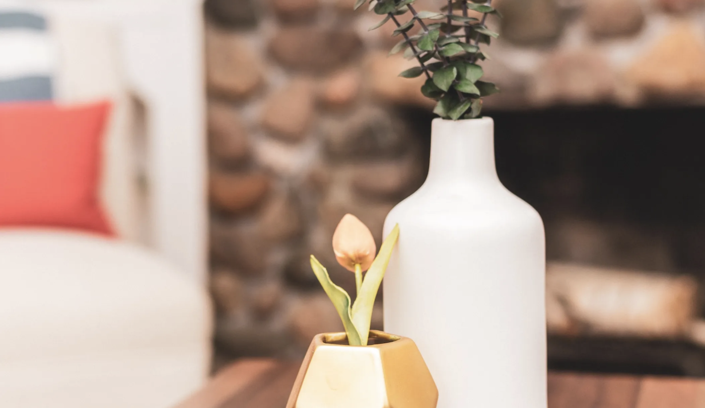 Two vases in cozy home living room. 