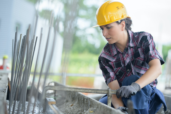 Woman working on a construction site