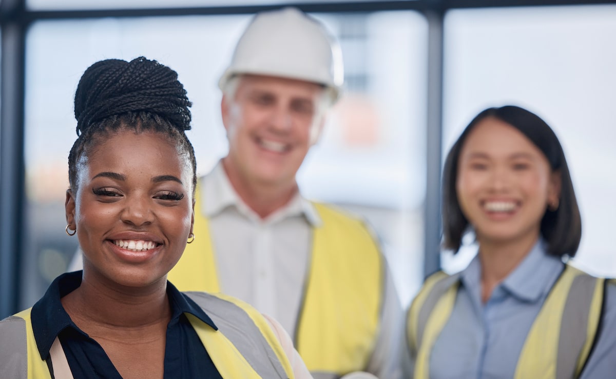 Diverse construction workforce with different ages, genders, races