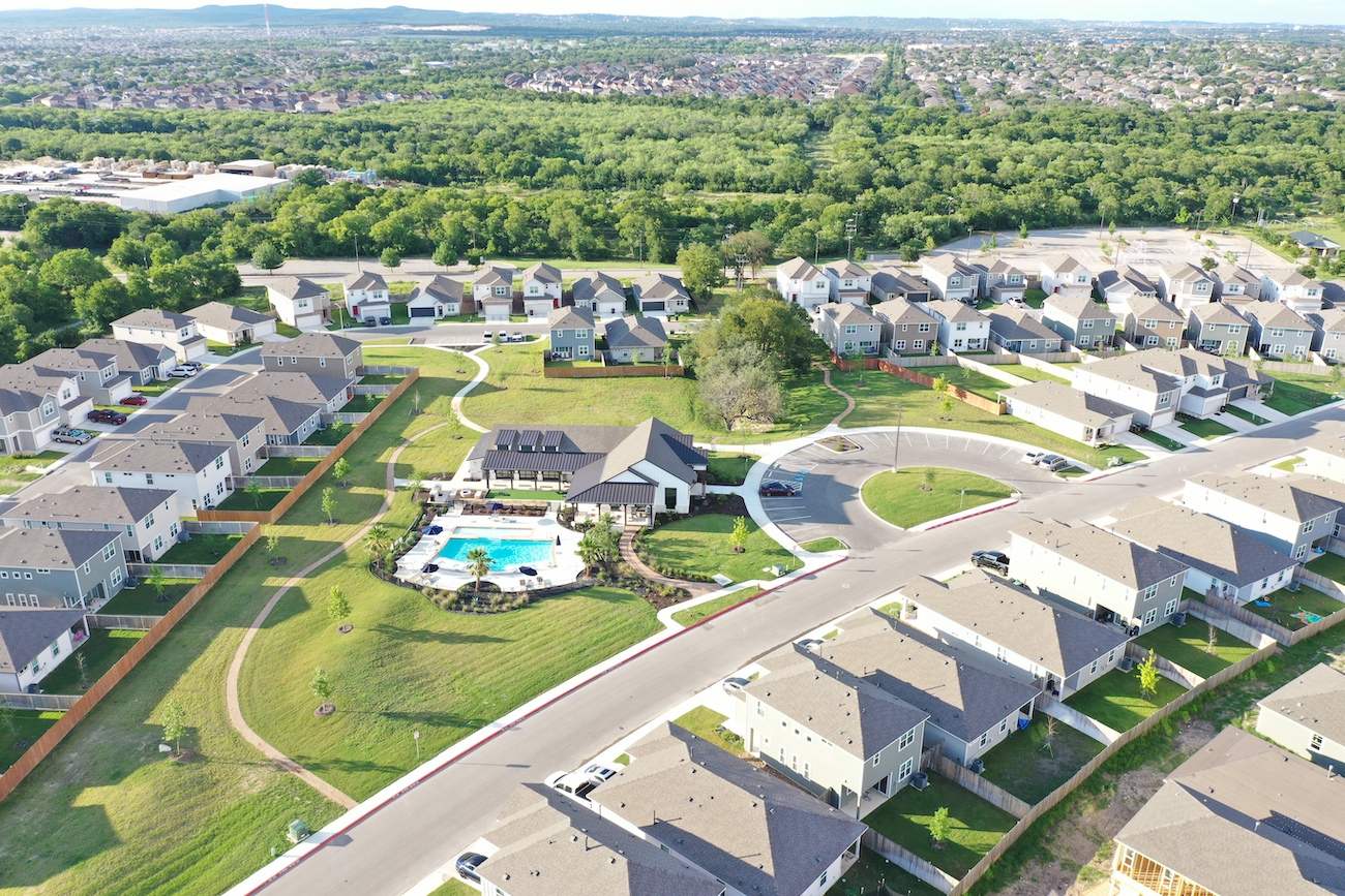 Aerial view of single-family build-to-rent homes in a master planned community