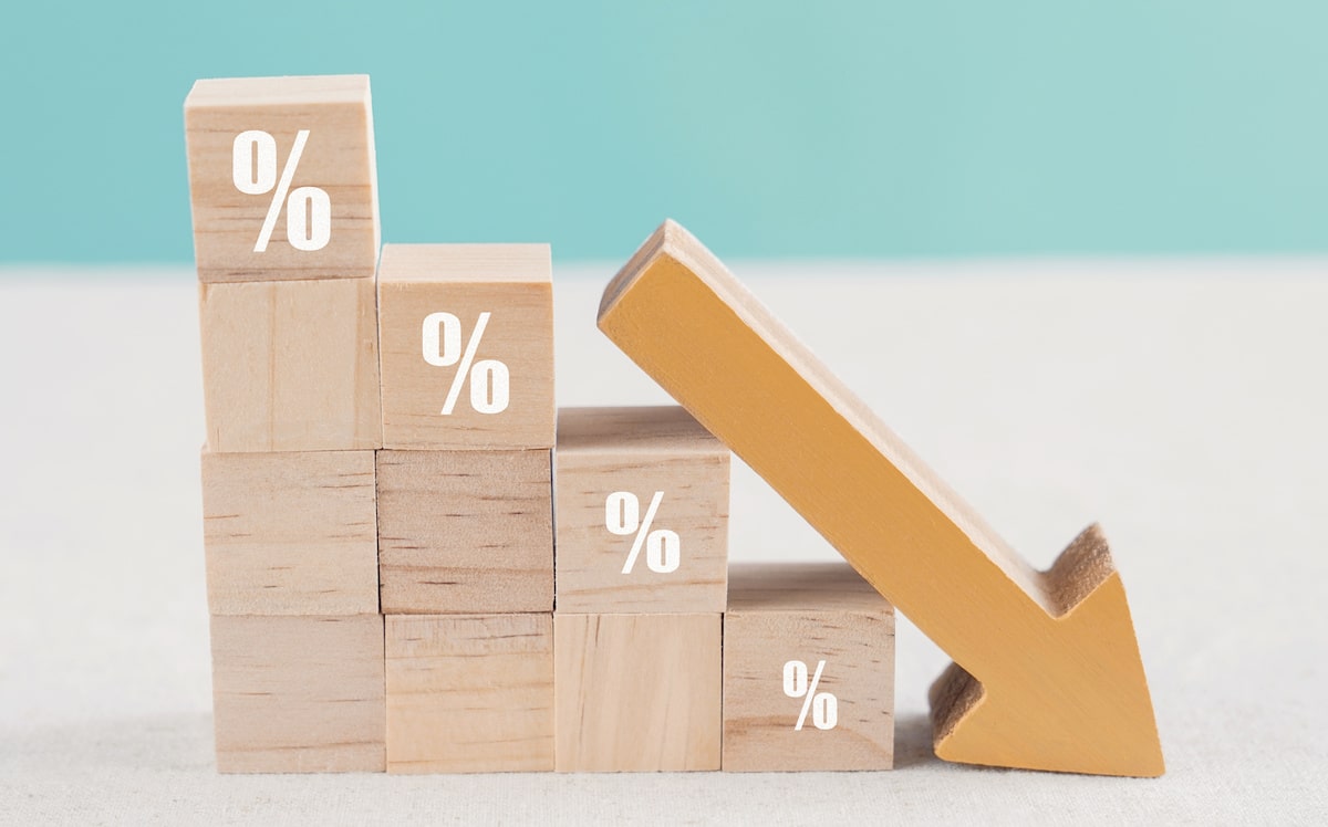 Stacks of wooden blocks with white percentages decreasing in size