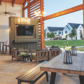 Common outdoor living area at multifamily rental development Hermosa Village in Texas